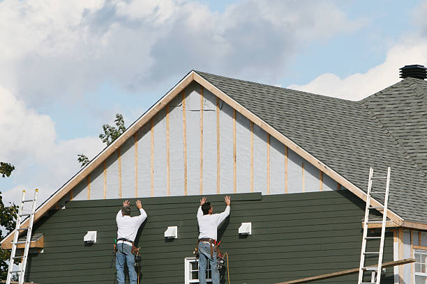 Professional Siding Installation technician working in Rushville, IN